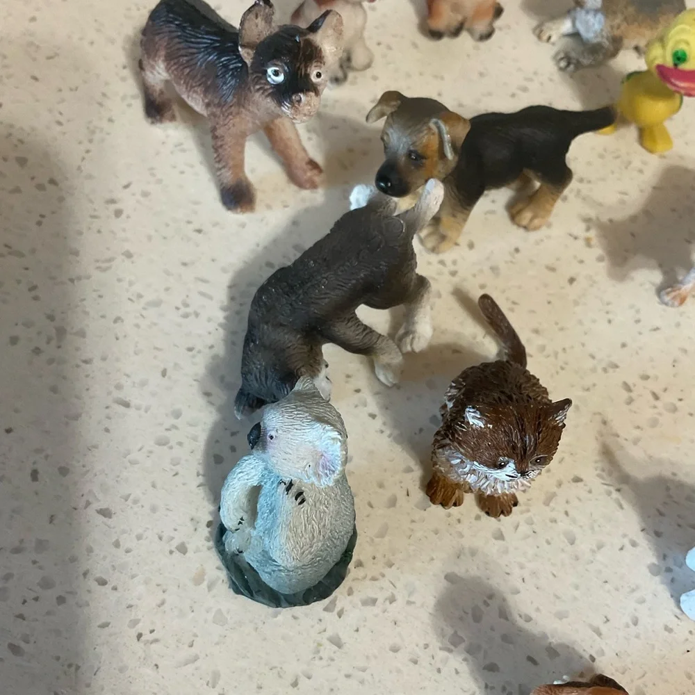 Assorted Small Pet Figurines Set